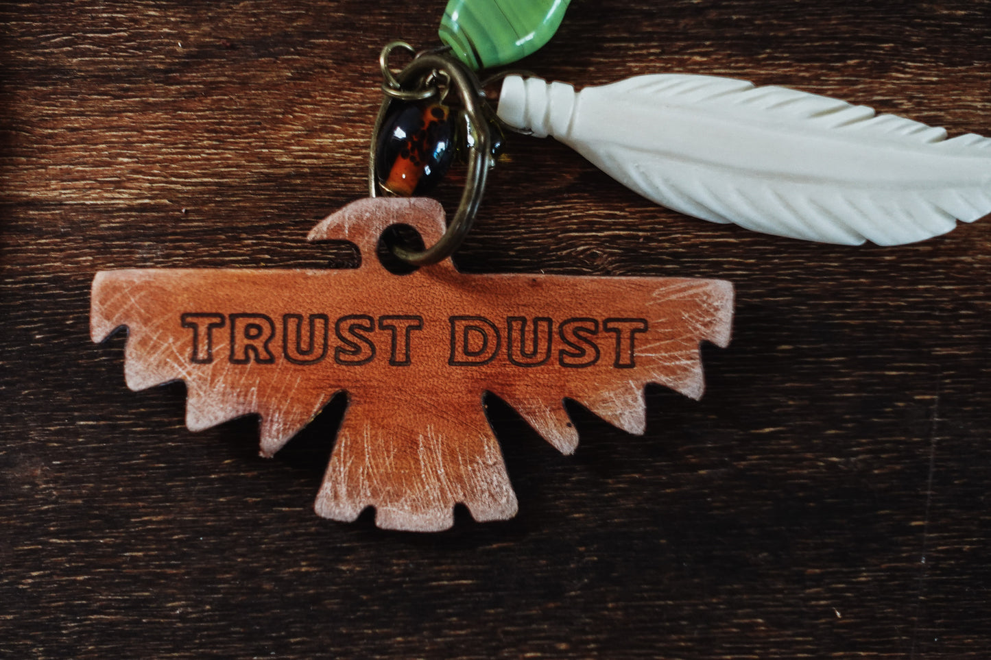 MOTOBELLA TRUST THE DUST KEYCHAIN