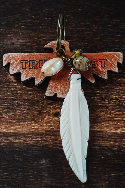 MOTOBELLA TRUST THE DUST KEYCHAIN