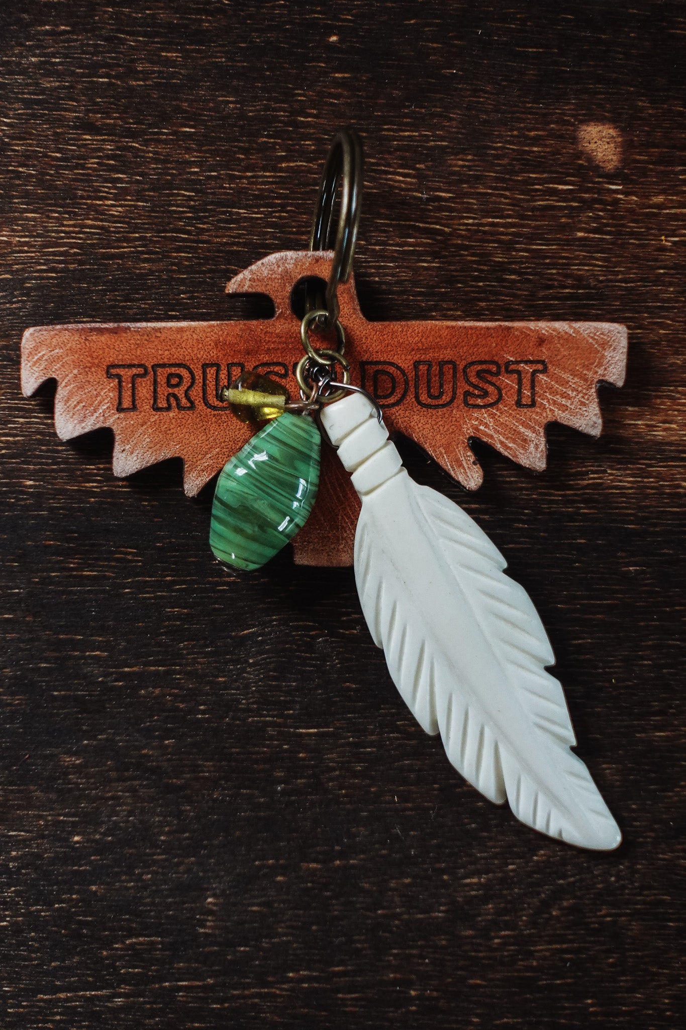 MOTOBELLA TRUST THE DUST KEYCHAIN
