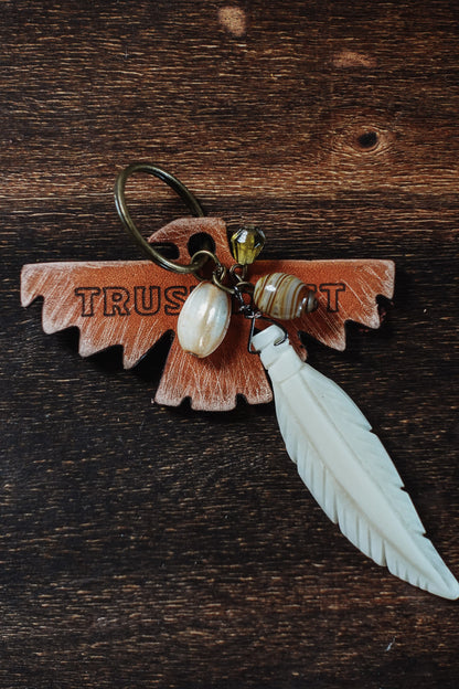 MOTOBELLA TRUST THE DUST KEYCHAIN