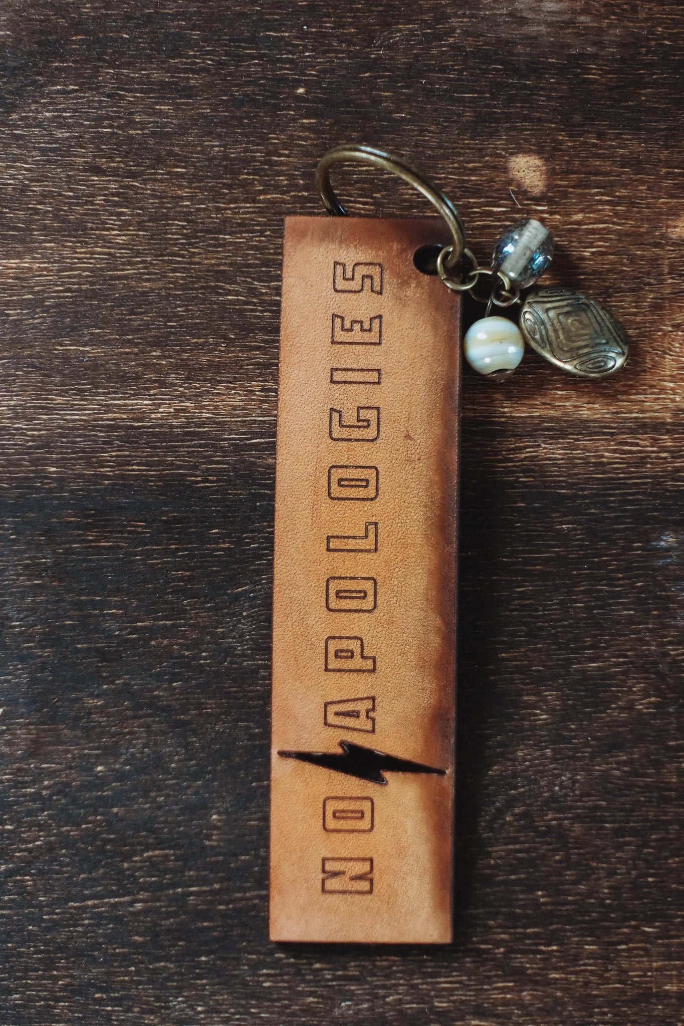 MOTOBELLA NO APOLOGIES KEYCHAIN