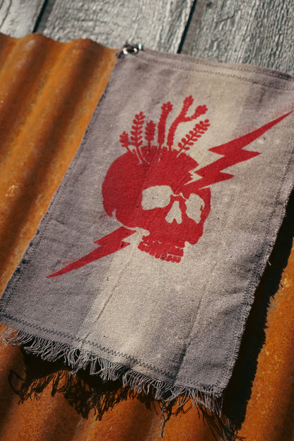 The Signal Flag — Skull & Lightning No. 01 · Red on Aged Canvas