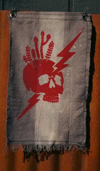 The Signal Flag — Skull & Lightning No. 01 · Red on Aged Canvas