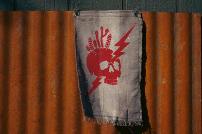 The Signal Flag — Skull & Lightning No. 01 · Red on Aged Canvas