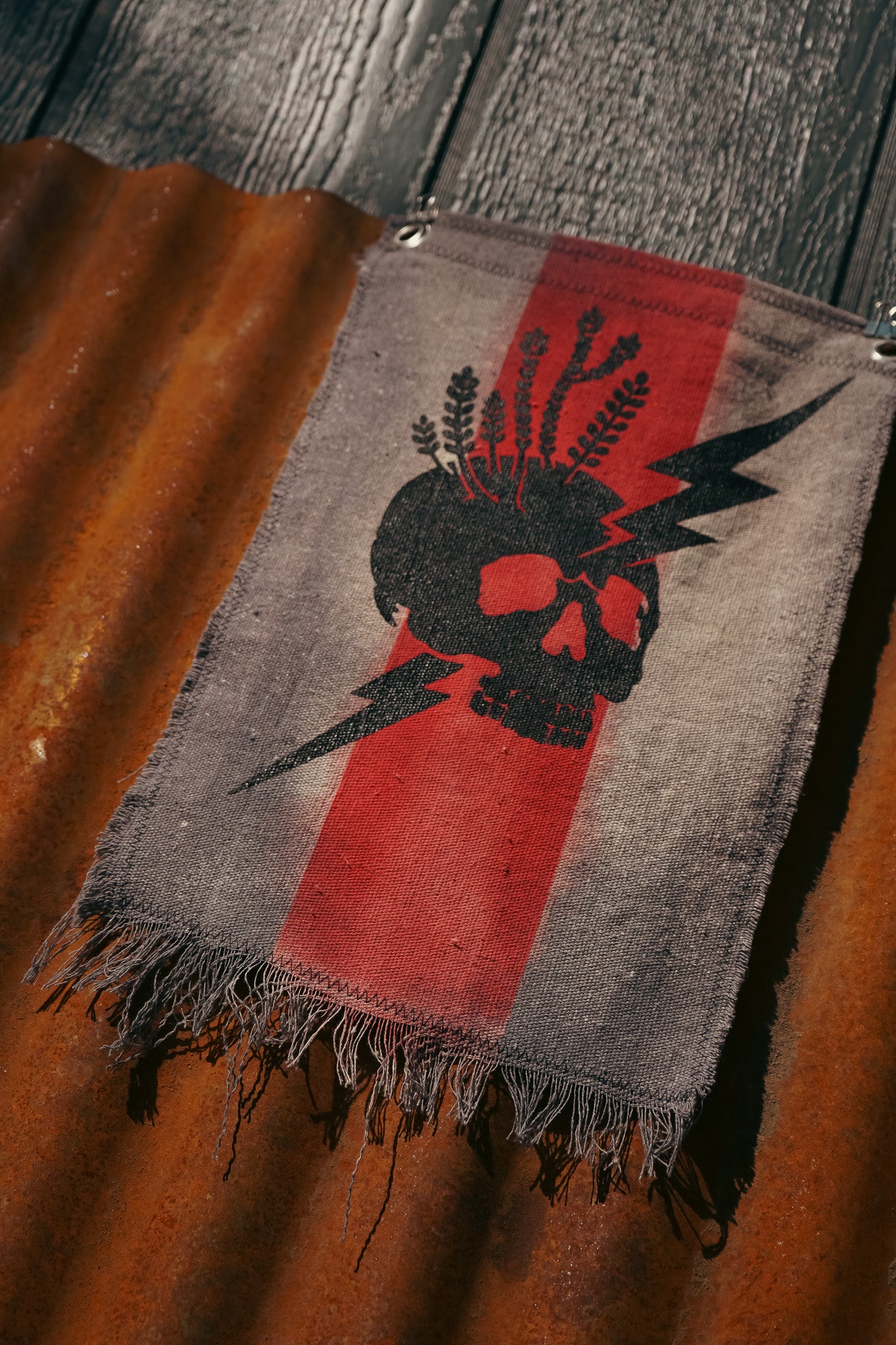 The Signal Flag — Skull & Lightning No. 02 · Black on Red Stripe · 10×14"